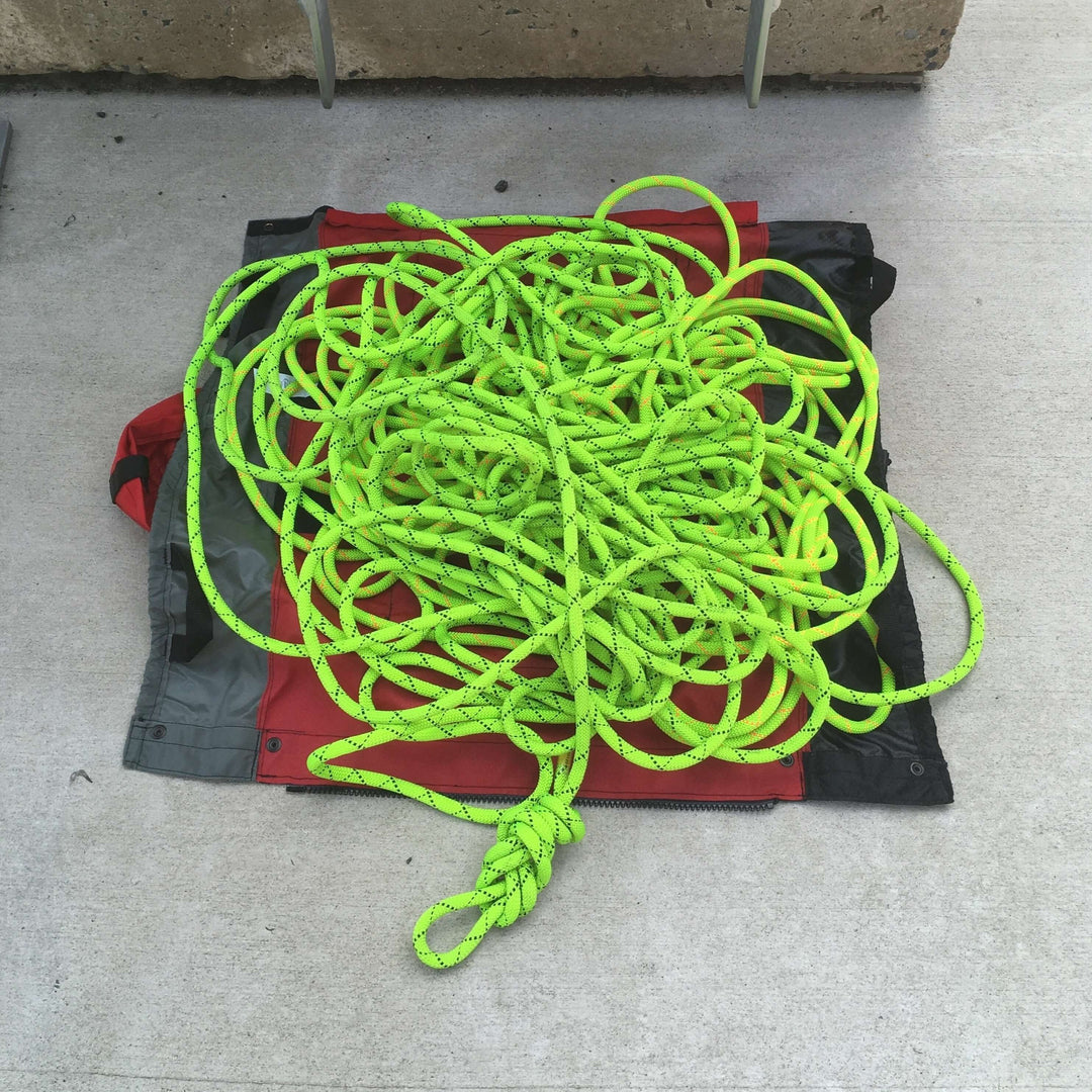 Red Anderson Rescue Solutions Breakout Rope Bag filled with green rope