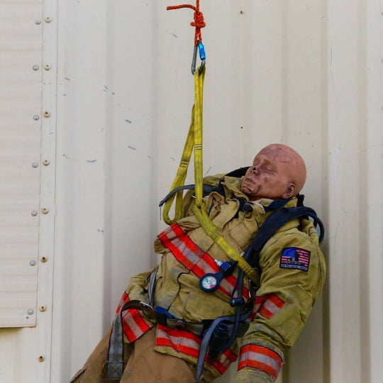 Multi-Loop Rescue Strap lifting body in training exercise